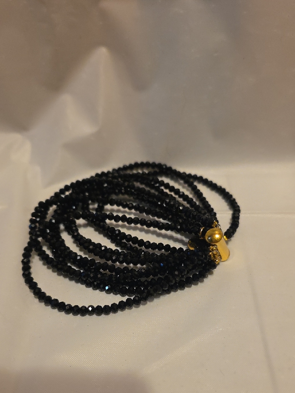 Kinsley Armelle Black Beaded Multi-Strand Bracelet with Gold Accent